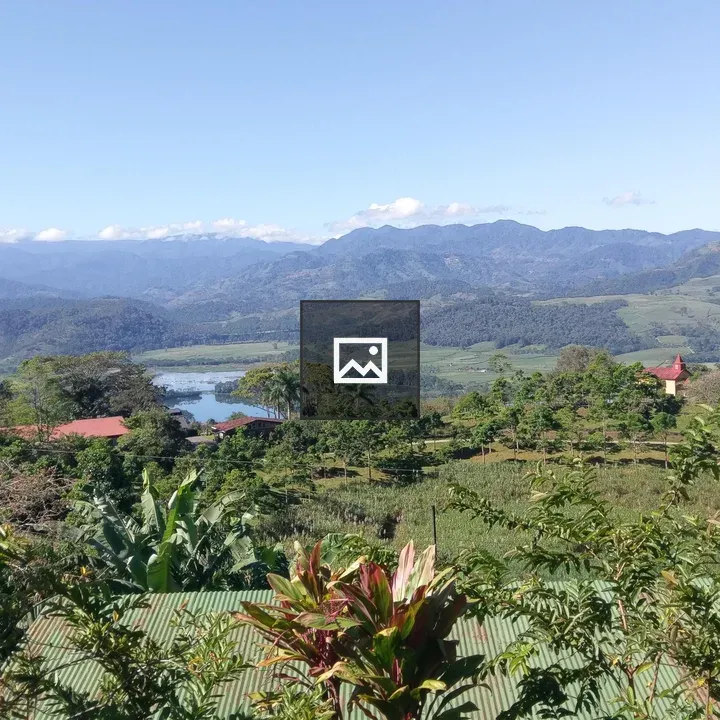 Panoramic Valley with Lake and Hills