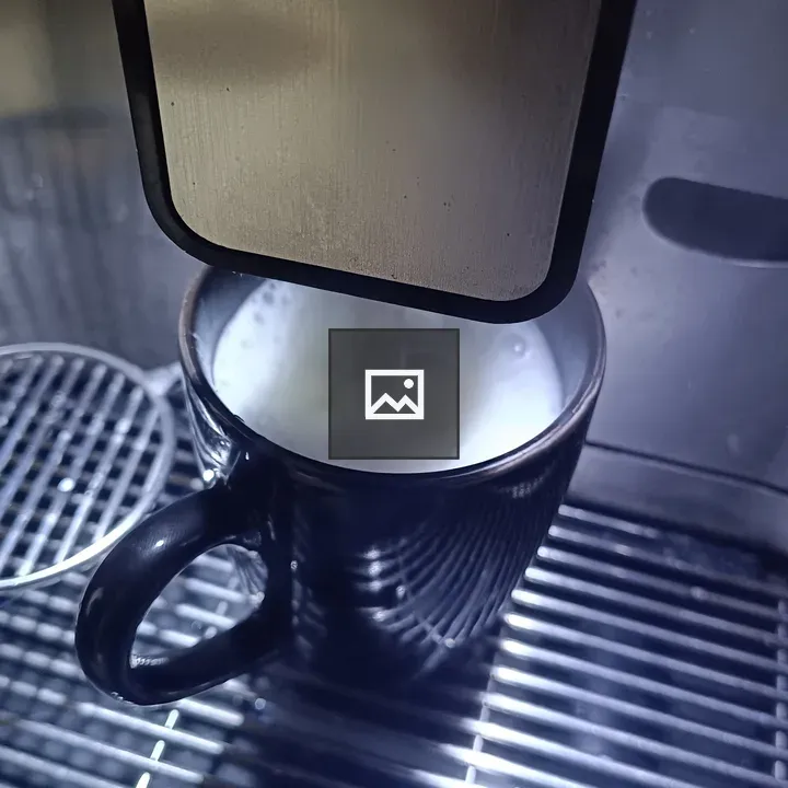 Milk in a Cup from Coffee Machine