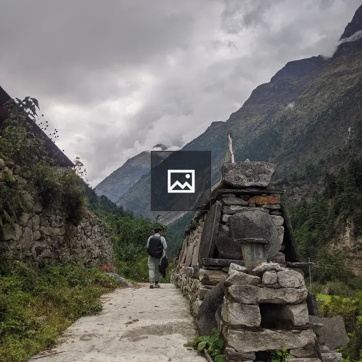 Person walking along stone path