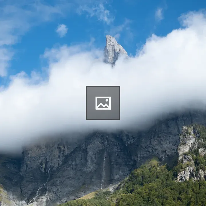 Mountain Peak Above Clouds