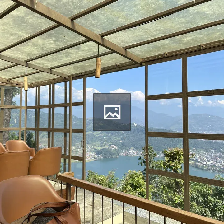 Cozy seating area with bag by lake