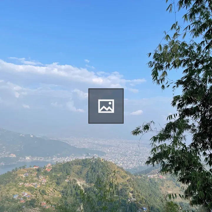 Scenic hill landscape with distant city