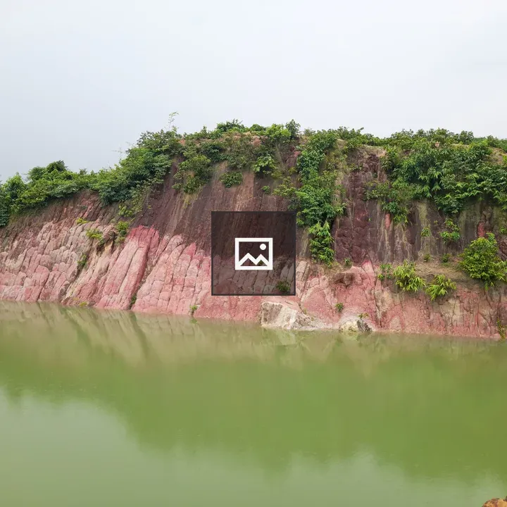 Rocky Red Cliff by the River