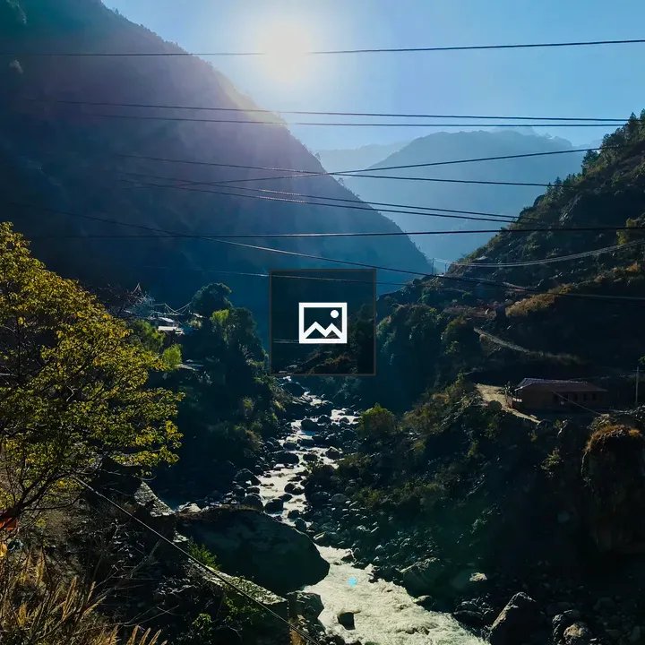 Sunlit Mountain Valley Landscape