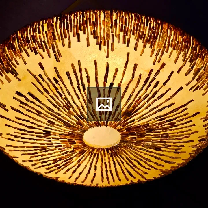 Ceiling lamp with radial pattern