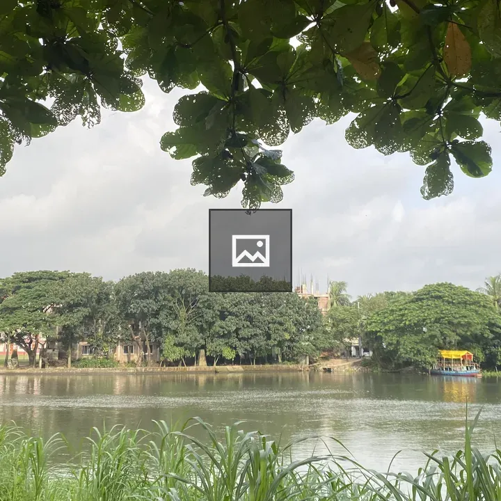 Serene lake view with building