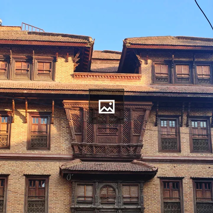 Brick building with wooden windows