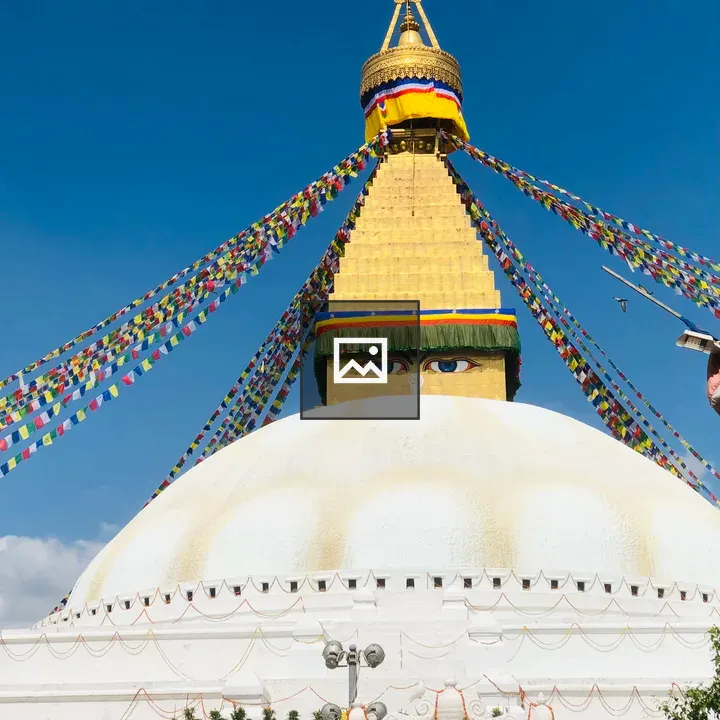 White stupa with gilded spire