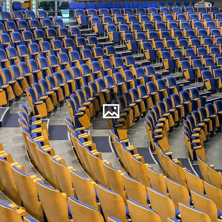 Empty auditorium with blue seats