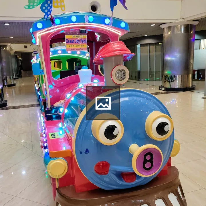 Toy train with smiling face
