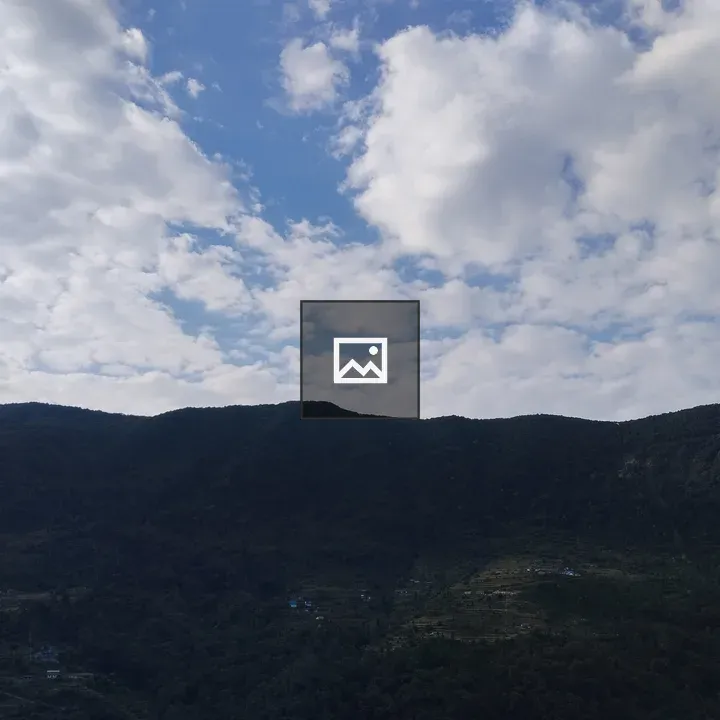 Mountain range with lush foothills