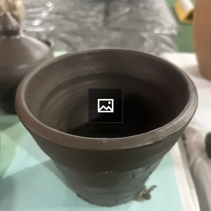 Hand-thrown clay pot
