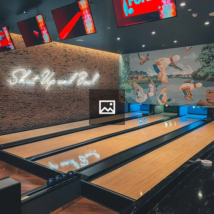 Miniature bowling alley display