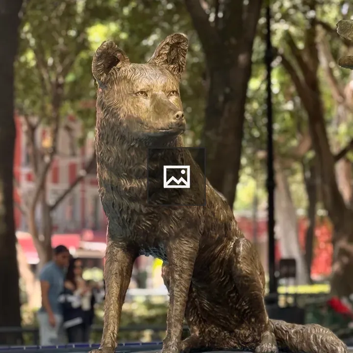 Bronze Coyote Statue on Stone Base