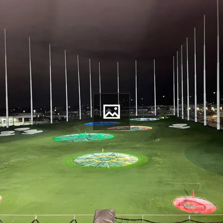 Golf driving range at night