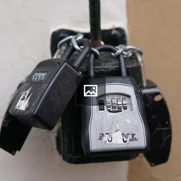 Close-up of three combination locks
