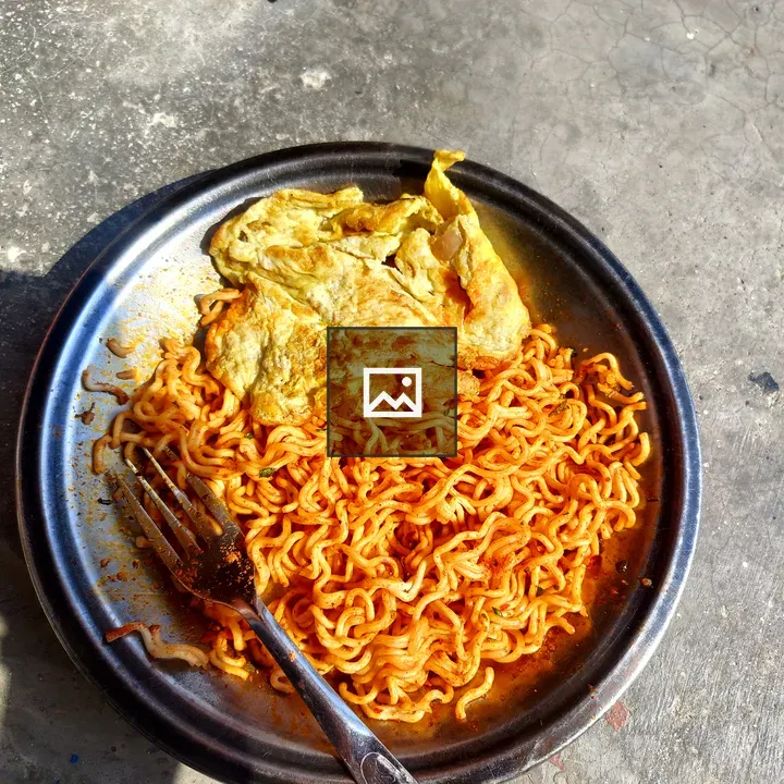 Stainless steel plate with spicy noodles