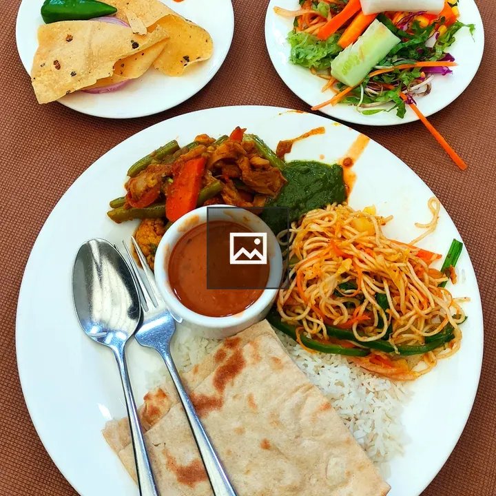 Lunch plate with rice and noodles