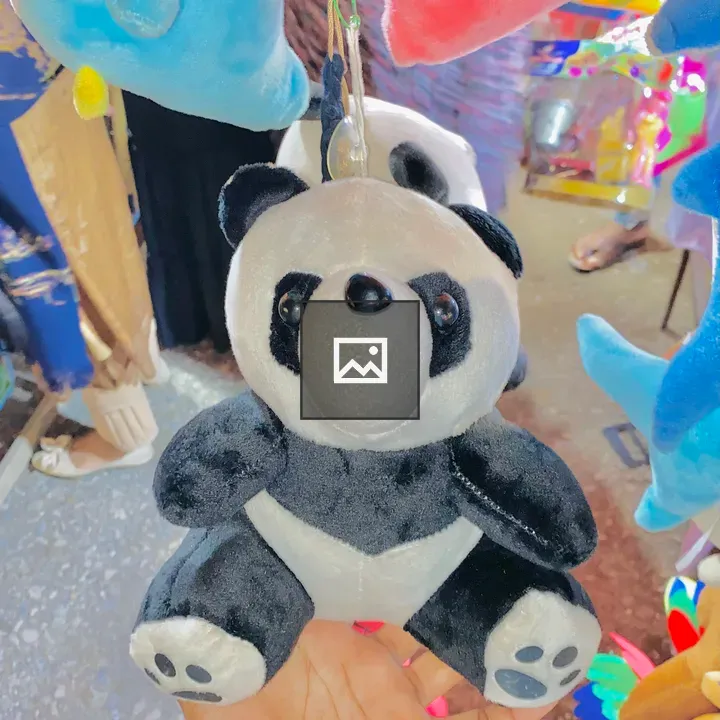 Plush Panda Toy in Market Scene