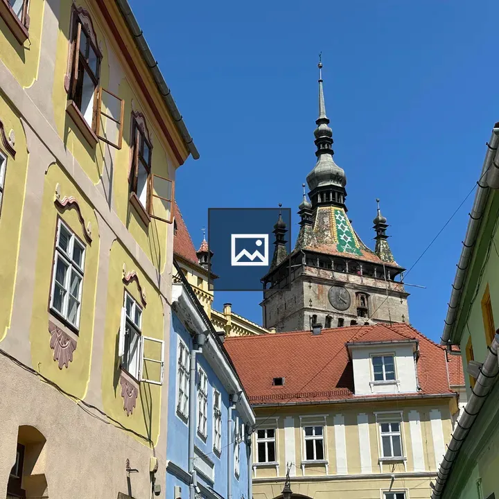 Street view in Sighișoara with clock tower
