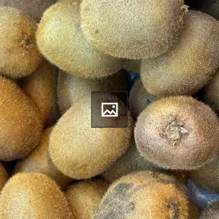 Close-up of unpeeled kiwis