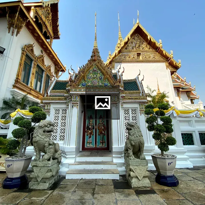 White ancient building with statues