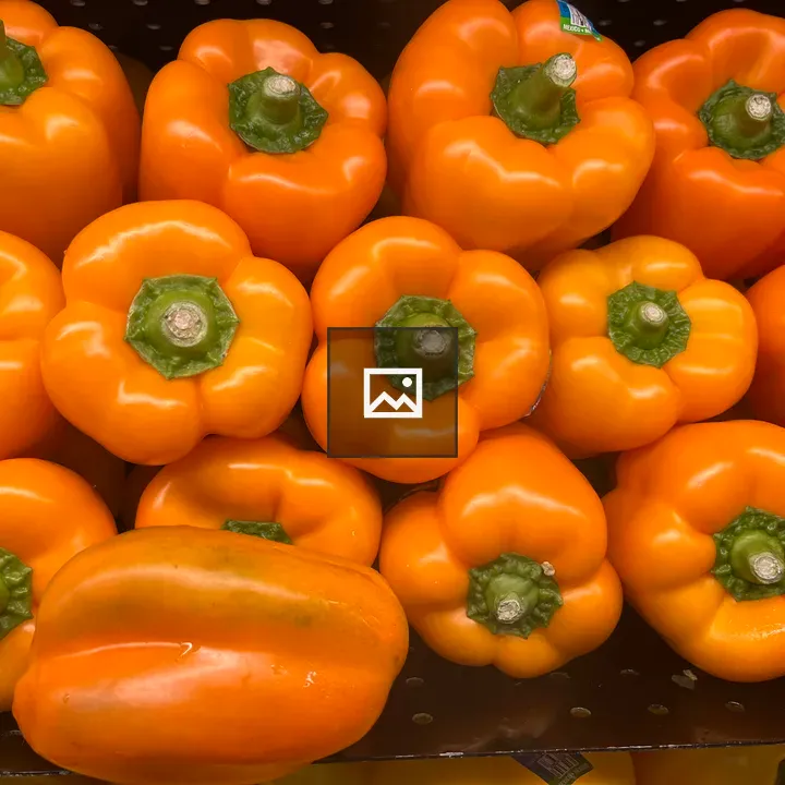 Orange peppers stem end view