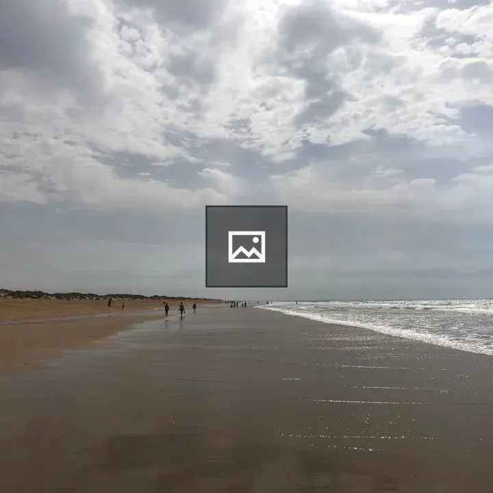 Cloudy Sky Over La Antilla Beach