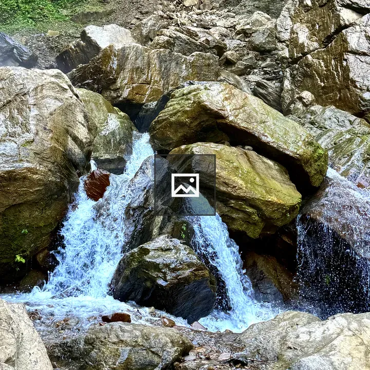 Stream over mossy rocks
