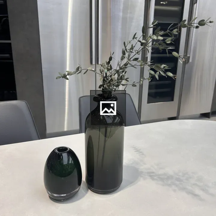 Modern kitchen with glass vases