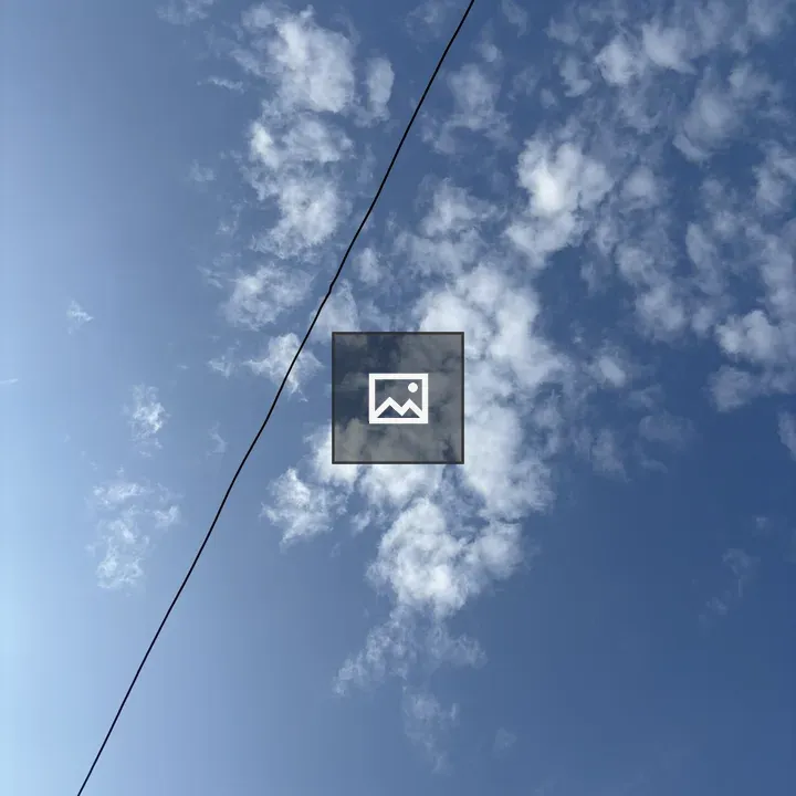 Blue Sky with Clouds and Power Lines