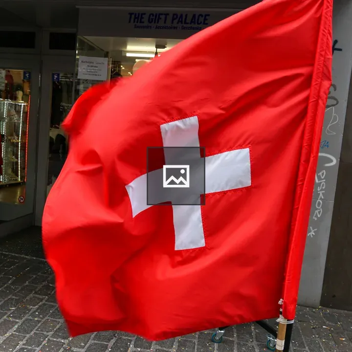 Swiss flag on city street