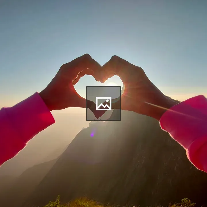Sunrise Through Heart-Shaped Gap