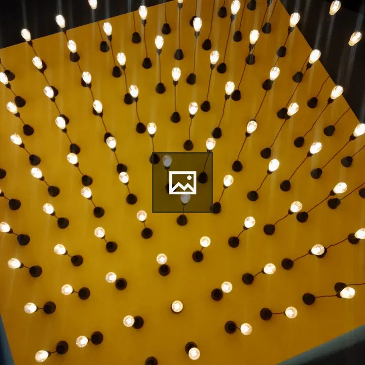 Hanging yellow lights in background