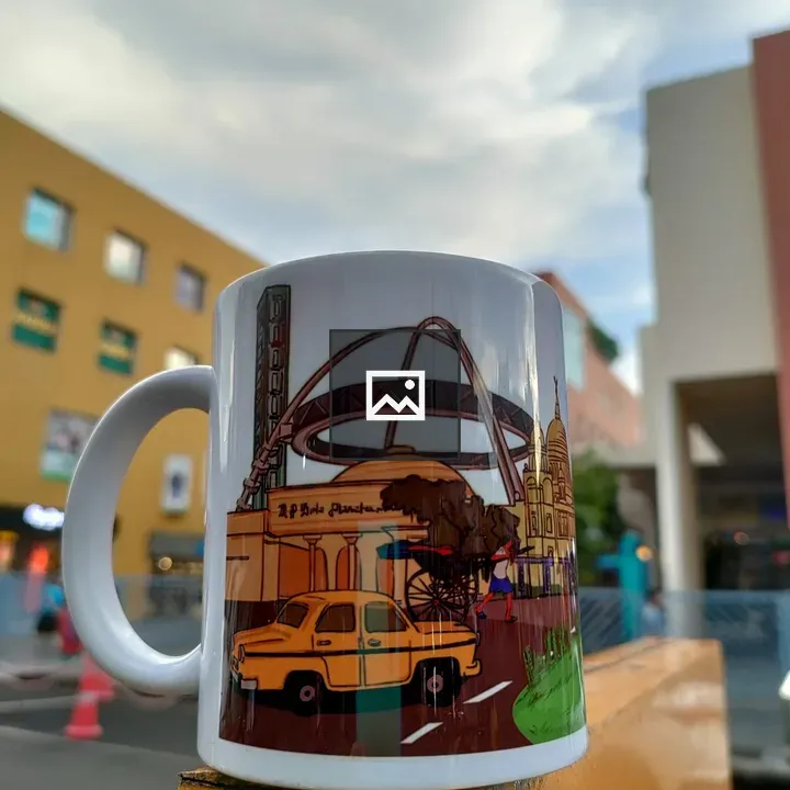 White mug with colorful urban scenes