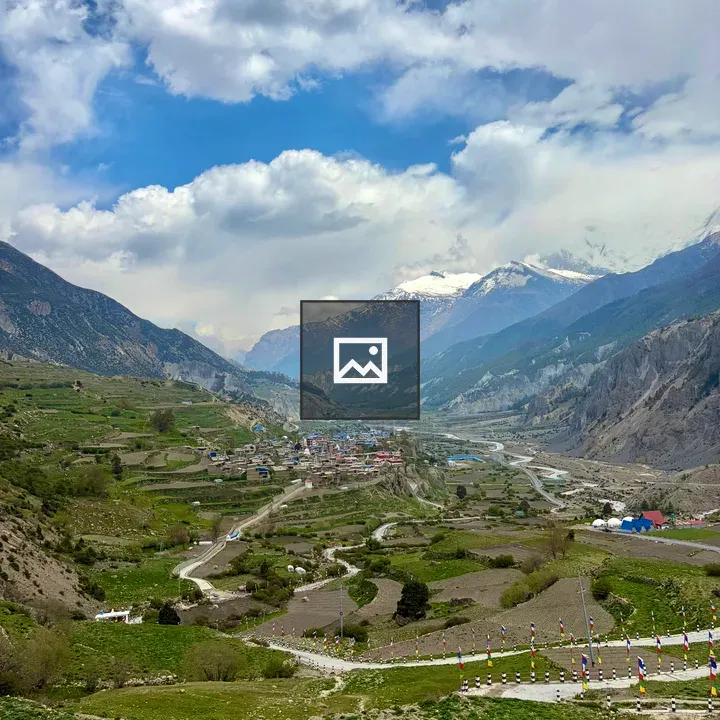 Mountain valley landscape with winding roads