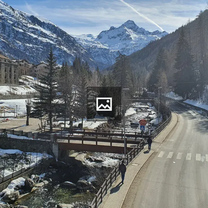 Mountain road with torrent