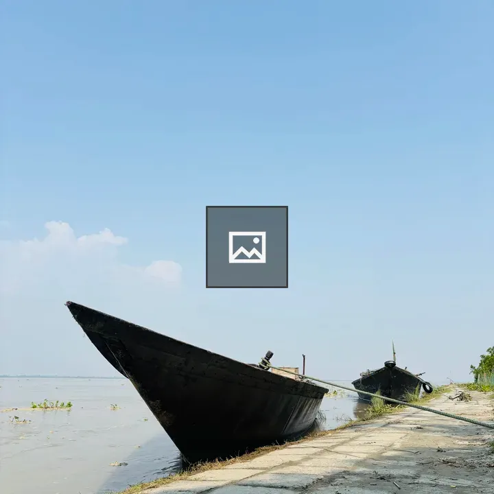 Two boats on calm river