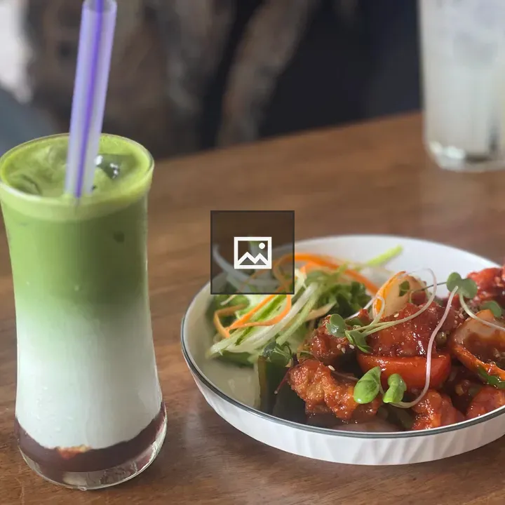 Layered green matcha latte and stir-fry dish