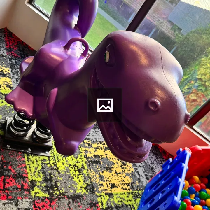 Purple dinosaur rocking toy