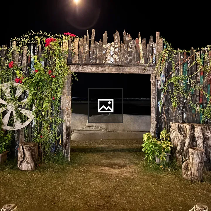 Rustic wooden gate with vines