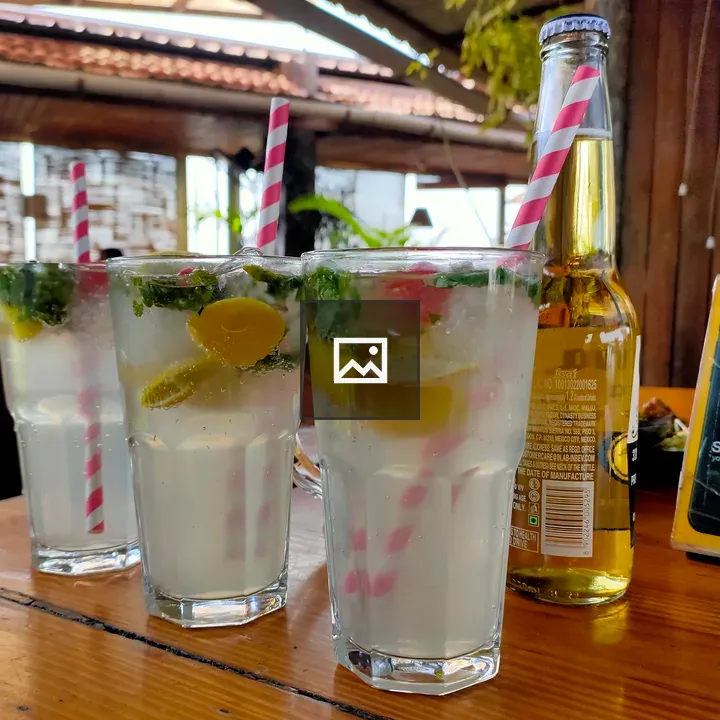 Mocktails and Beer on Sunlit Table