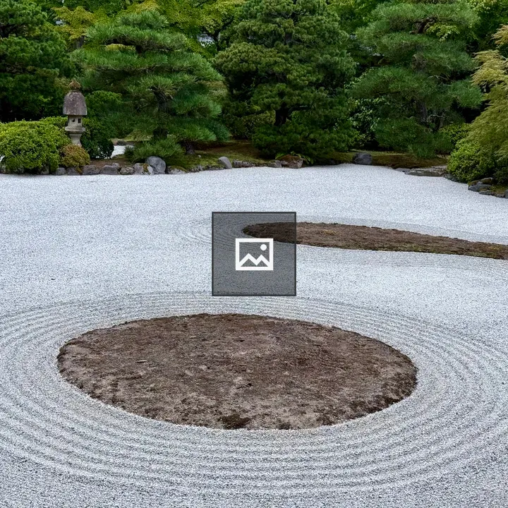 Raked gravel garden with moss islands