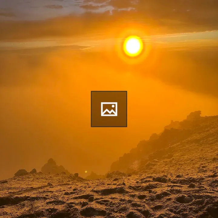Sunrise Over Mountain Peak