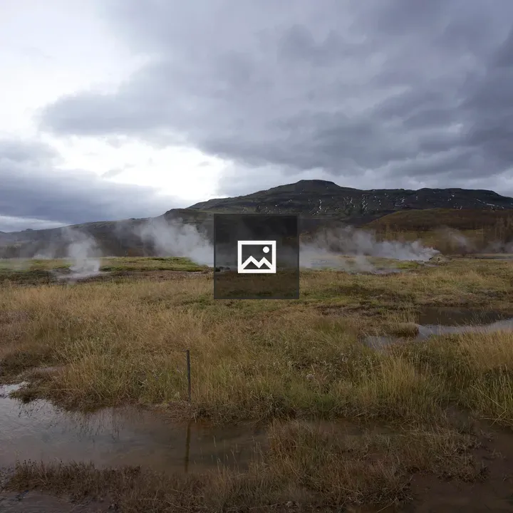 Geyser in geothermal landscape
