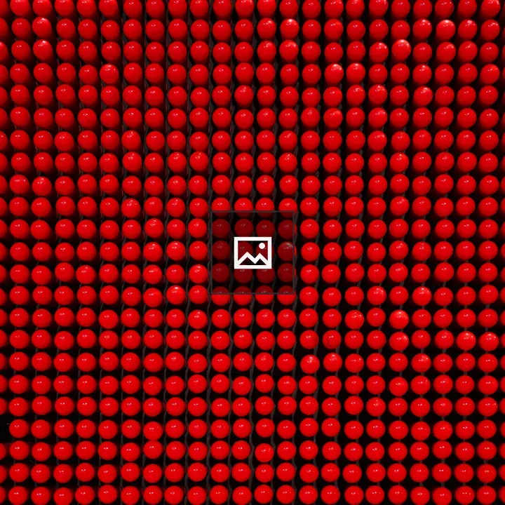 Pegboard of Red Shiny Balls