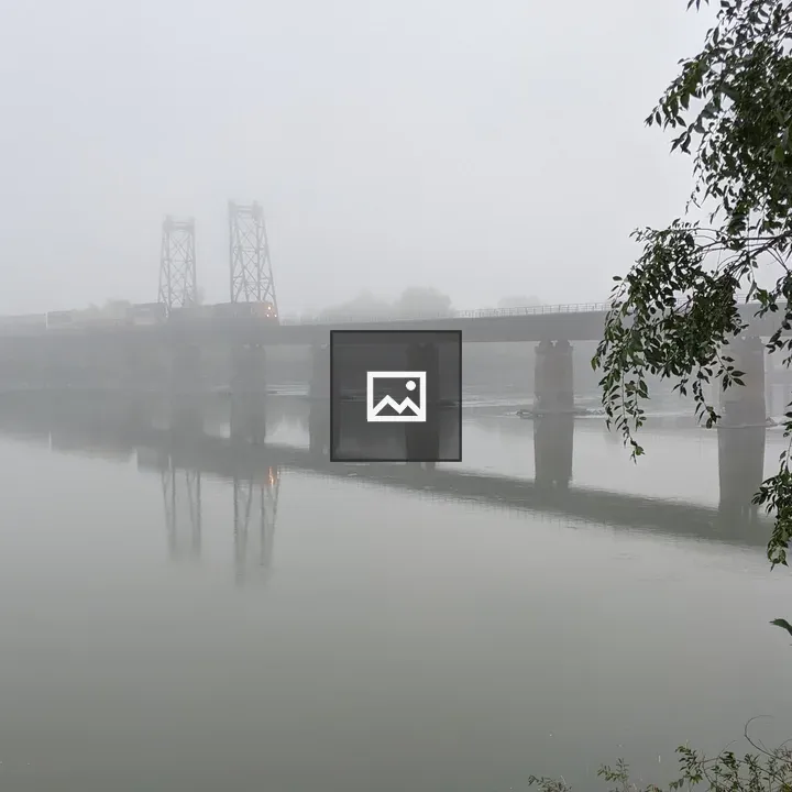 Train over bridge amid smoke in Kamloops