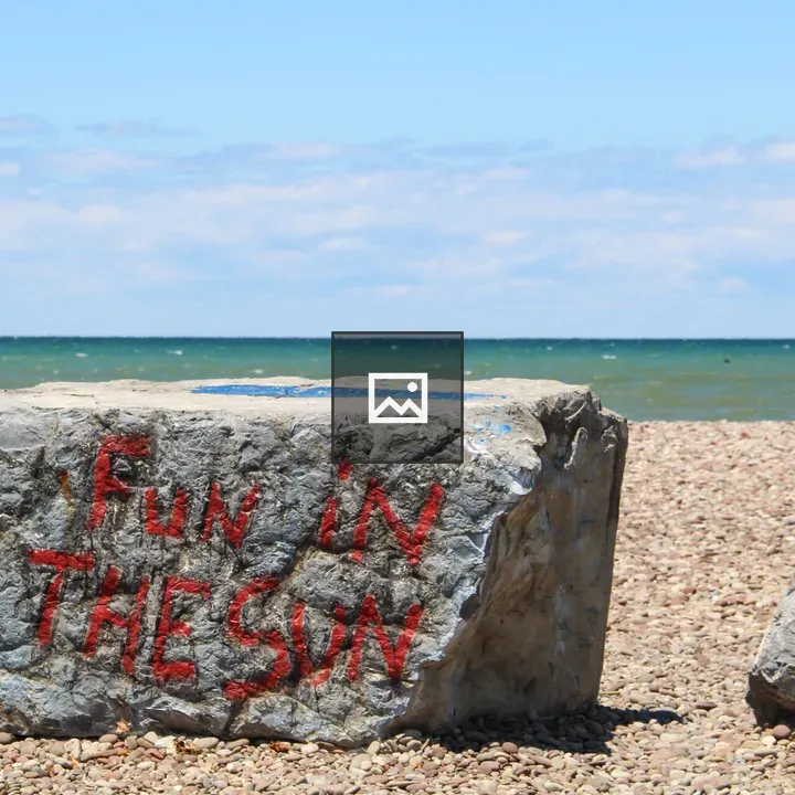 Giant rectangular stone on Lake Ontario beach