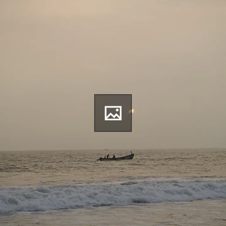 Fisherman boat on sea at sunset