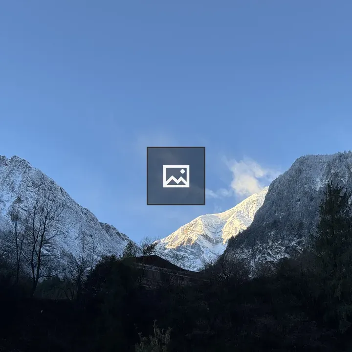 Snow-capped mountains and trees